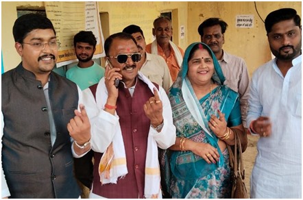 Madhya Pradesh Cabinet Minister Rakesh Shukla casts his vote at a polling booth in Mehgaon.