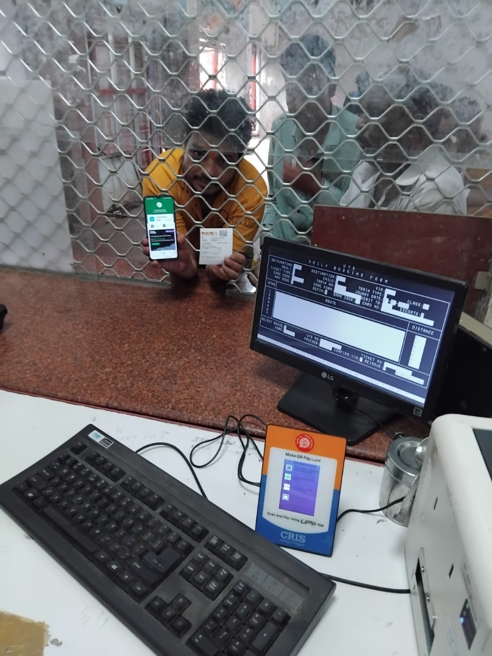 Digital QR Code Display at Railway Ticket Counters Makes Payment Easier