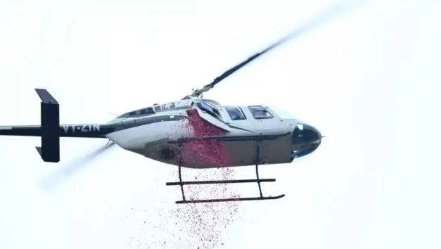 Chhattisgarh CM Sai Showers Flowers on Kanwariyas from Chopper