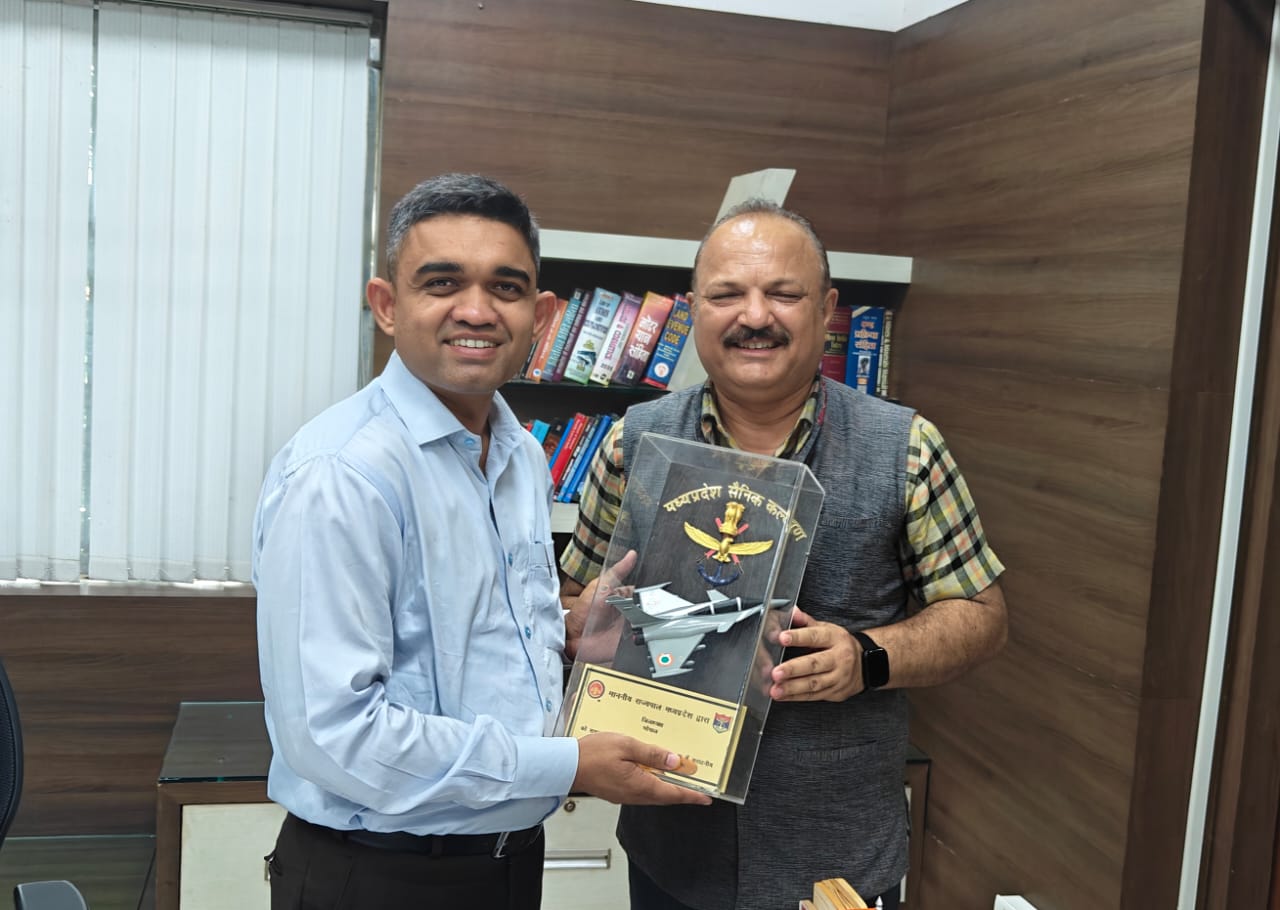 Governor honours Collector Mishra with commendation certificate for meeting target
