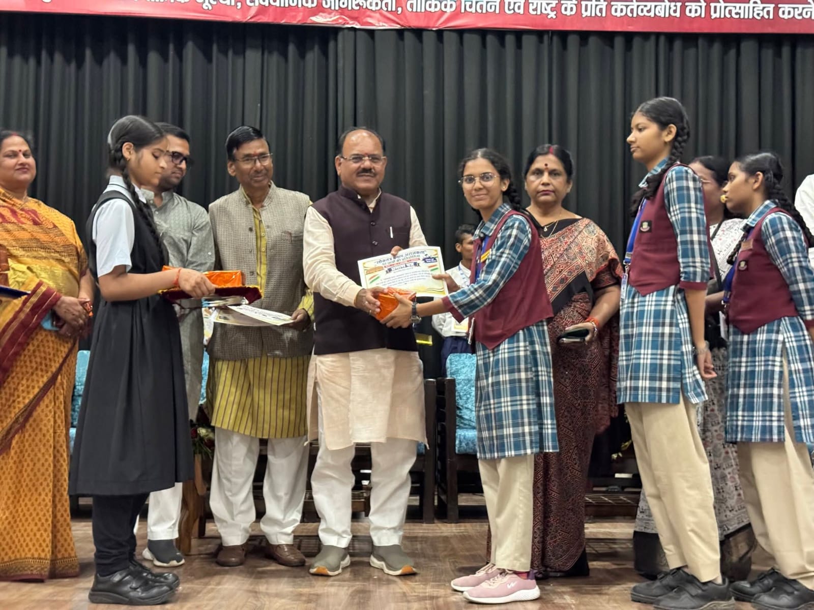 Student contest on democracy versus anarchy held at Model School